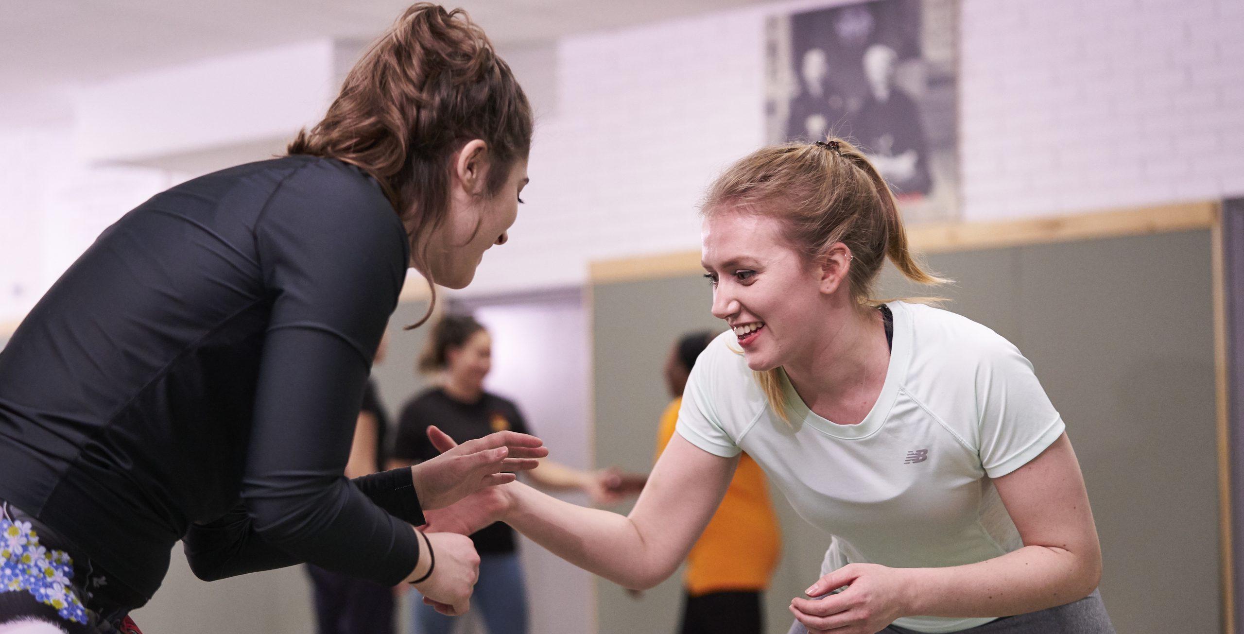 Two white women aged 25-35 boxing