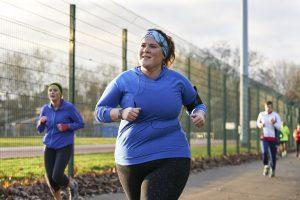 White woman aged 30-40 running