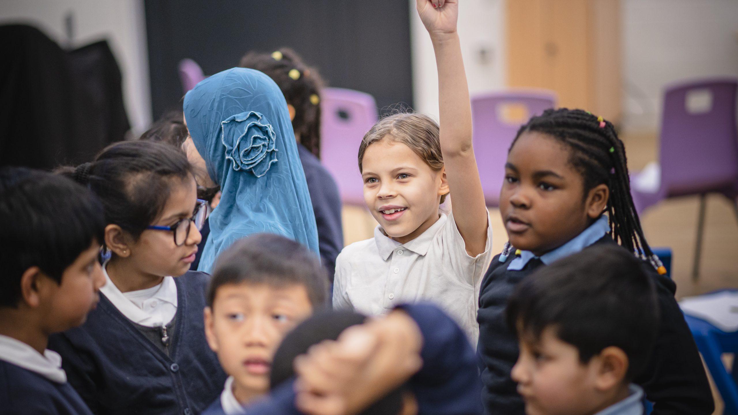 A group of primary school children from different backgrounds