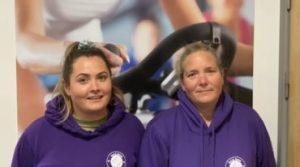 Tash and her daughter Georgia, both wearing the rounders team hoodies