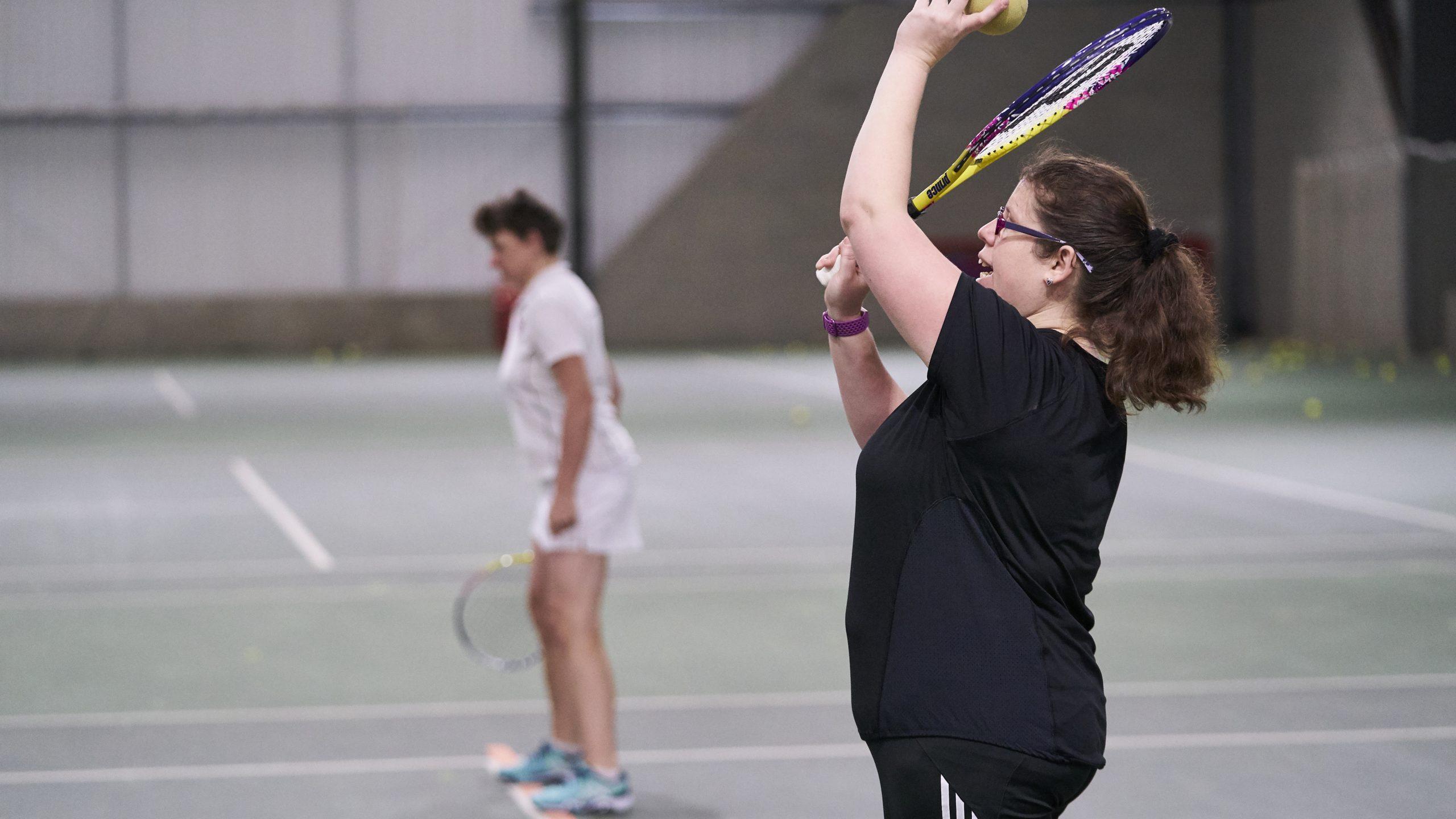 Woman playing tennis