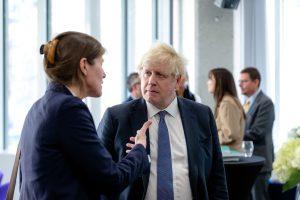 Stephanie speaking to Boris Johnson at the 2023 Global Soft Power conference